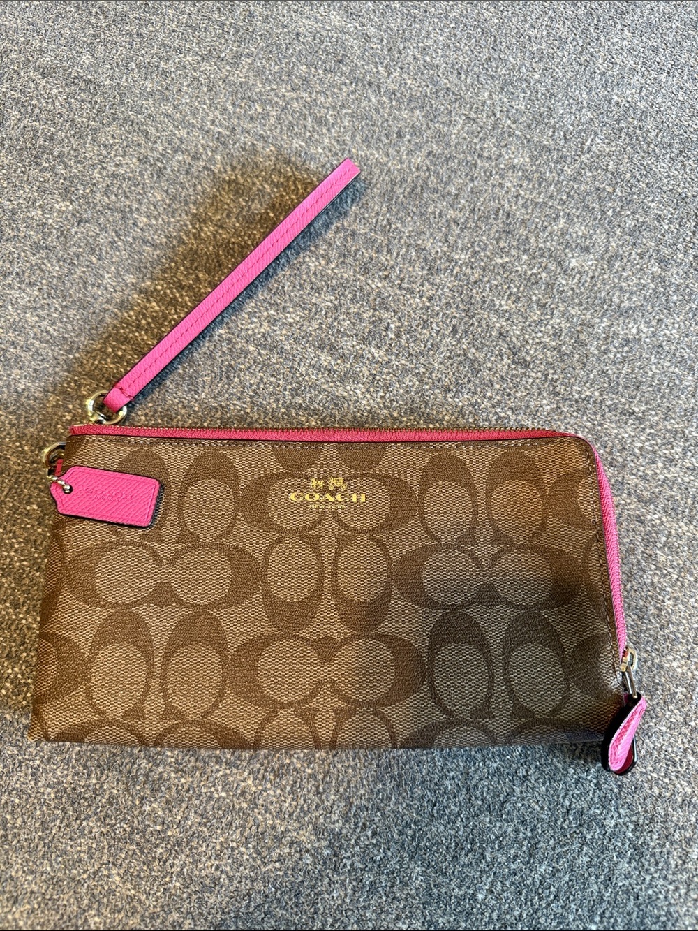 COACH Brown Signature Wristlet with Pink Trim and Strap